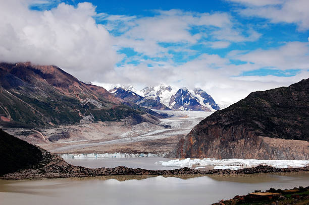 A stunning view of mountains, glaciers, and a clear sky showcasing natural beauty.