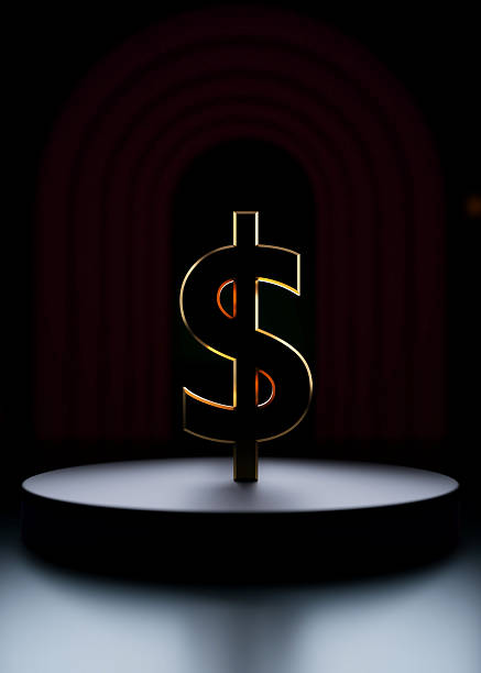 istock 3D illustrated US Dollar symbol in dark background 2243346465