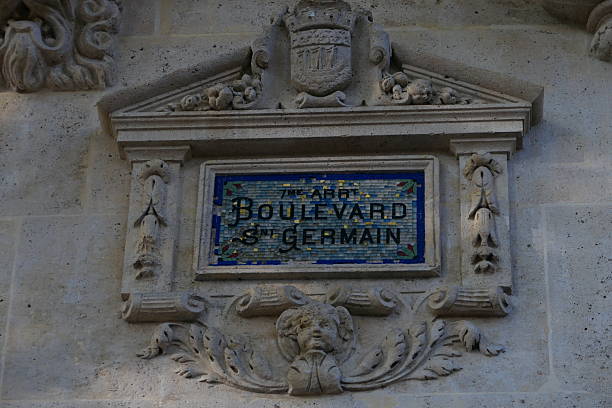 istock Old street name plaque, Paris 2243352684