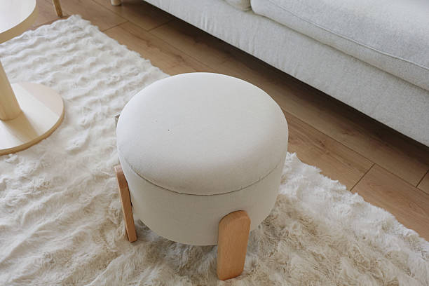 istock Stylish round ottoman in a modern living room setting 2243354226