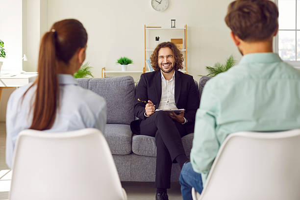 istock Smiling Psychologist During Family Therapy Session 2243354279