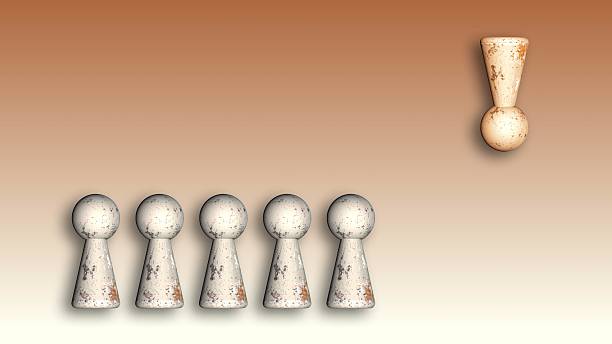 istock Abstract representation of loneliness. One figure hangs turned and away from the group 2243355392