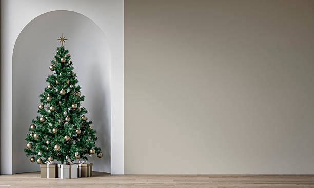 istock Modern minimalist unfurnished interior decorated for Christmas, with a  wall, a Christmas tree with presents in a wall niche, near a window 2243361055