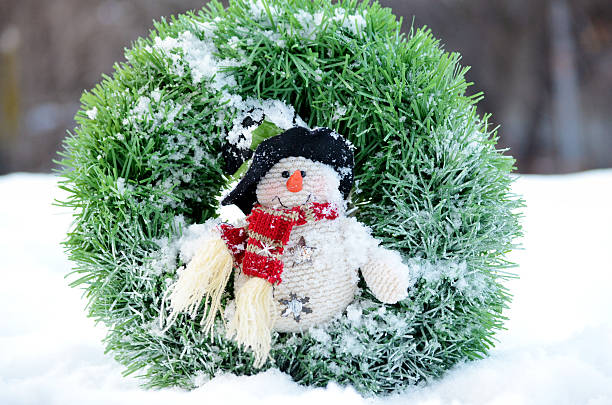 Christmas pine wreath with snowman