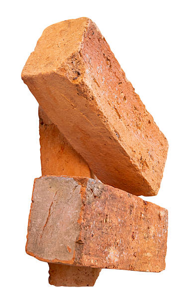 istock Side view of three cracked old red or orange bricks in stack isolated on white background with clipping path 2243364270