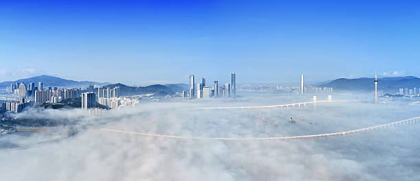 Macao cityscape and bridge panoramic in stratosphere cloud at morning, Macau.