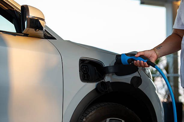 istock Electric Car Being Charged at Home Station. 2243377115