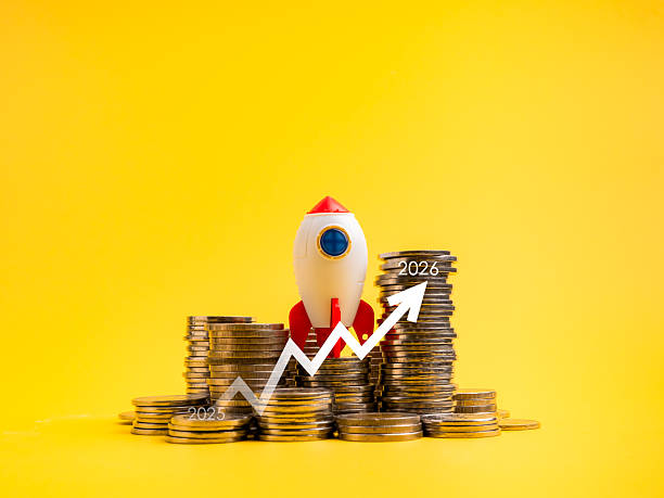 istock Rocket on stack of coins with upward arrow and 2025 to 2026 year growth chart. Concept of financial growth, investment success, economic planning, saving strategy, and wealth accumulation over time. 2243378201