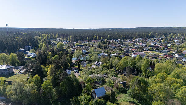 istock Aerial View of Small Town and Forest 2243378451