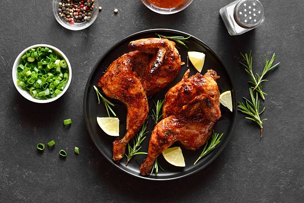 istock Grilled half chicken with lemon and rosemary 2243378938