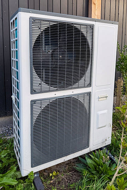 istock Modern outdoor heat pump unit 2243382561