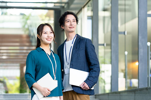 istock Young male and female engineers working in the office 2243383272
