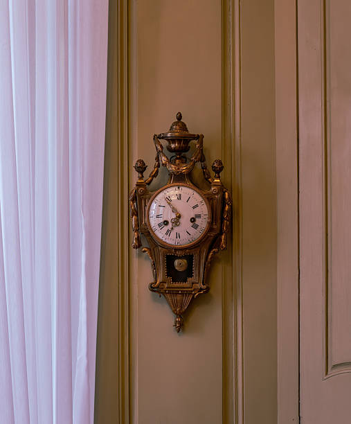 istock The old and vintage clock  in a room 2243383836