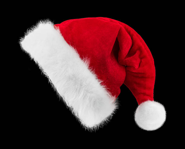 istock Red Santa Hat with White Fluffy Trim Isolated on Black Background — Classic Christmas Accessory 2243387271