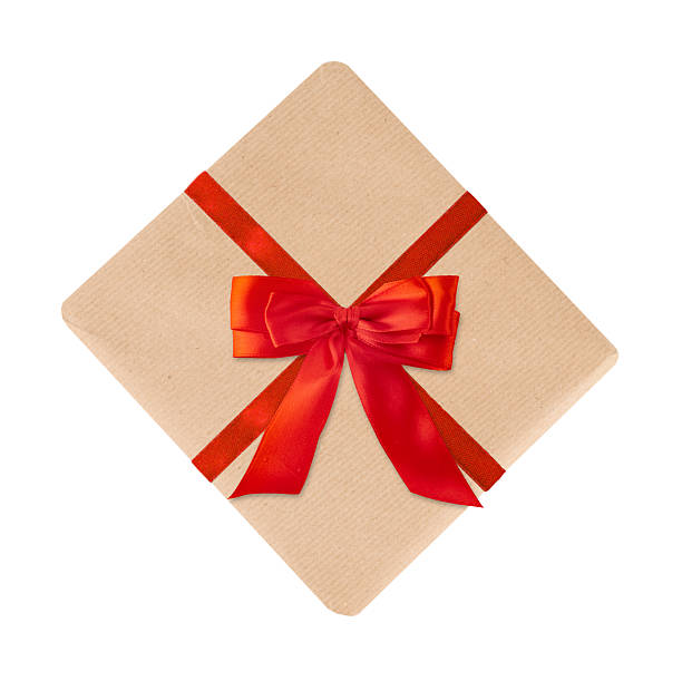 istock Gift Box with Red Ribbon — Brown Paper Present on White Background 2243387312