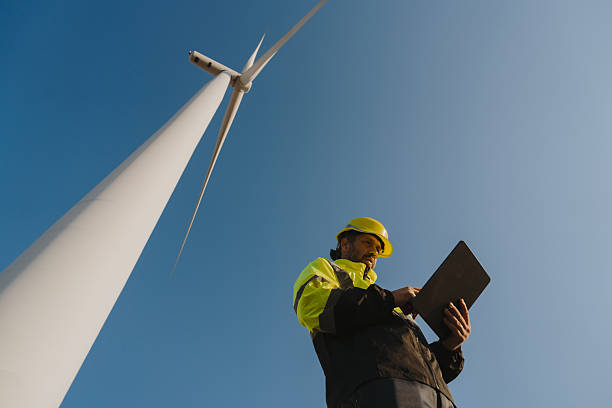 istock Engineers inspect wind farms, power generation systems, natural industries and environmental concepts, clean energy. 2243388386