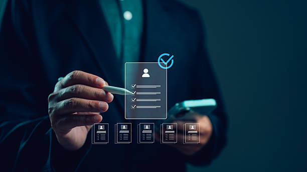 istock Digital Transformation in Recruitment Hand with Pen Selecting Candidates 2243388392