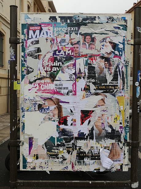 istock Billboard with torn posters, Perpignan, France 2243390873