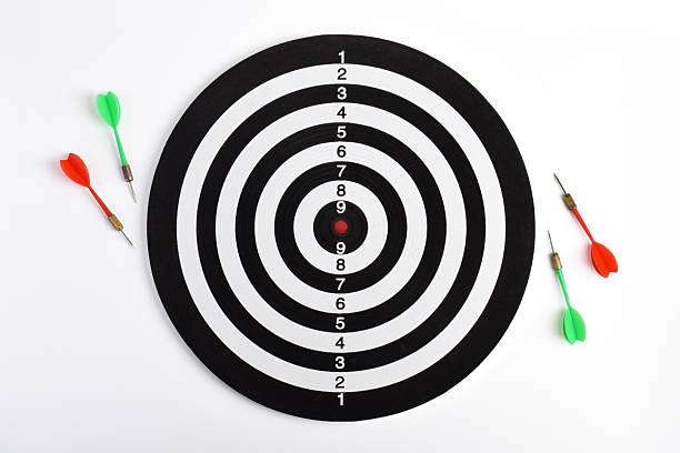 istock Dart board target with arrows, top view 2243391344