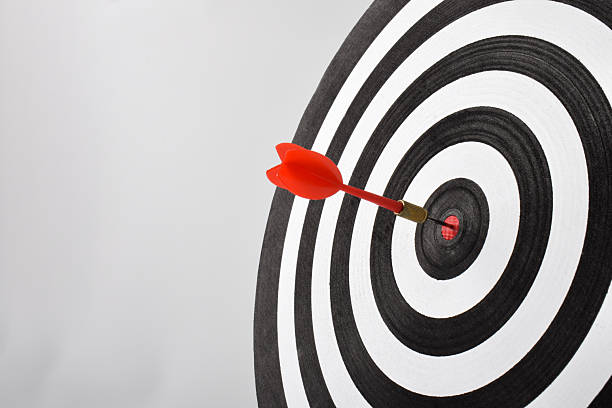 istock Dart board with arrow on white background 2243391503