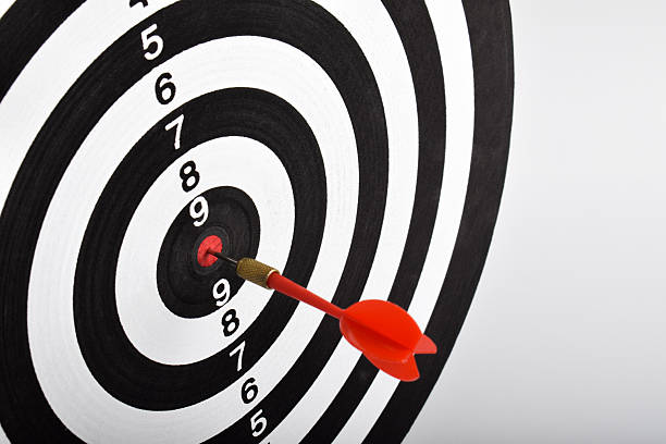 istock Dart board with arrow on white background 2243391570