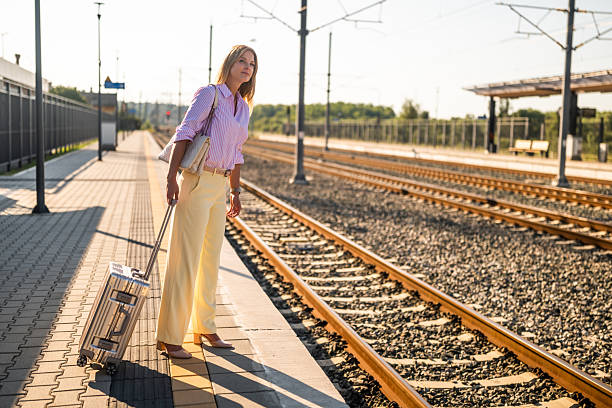 istock Confident businesswoman waiting for train 2243392524