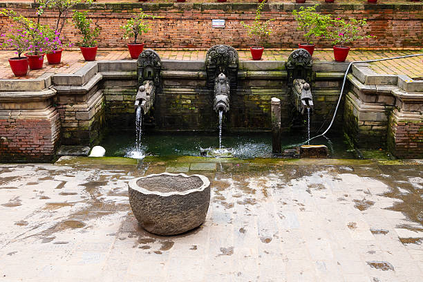 This photo captures the ancient stone water spouts, or Hiti, at Patan Durbar Square in Lalitpur, Nepal. The intricately carved stone structures with flowing water reflect the Newar craftsmanship and traditional water system that served as an essential part of the city’s ancient lifestyle.