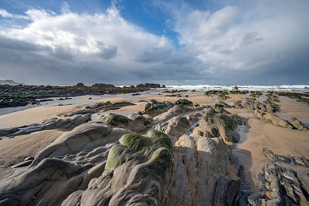 istock Ancient rock formations on Cornwalls Sandymouth Bay beach 2243396646