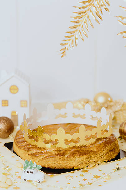 istock One delicious royal biscuit with a crown on the table at home. 2243399583