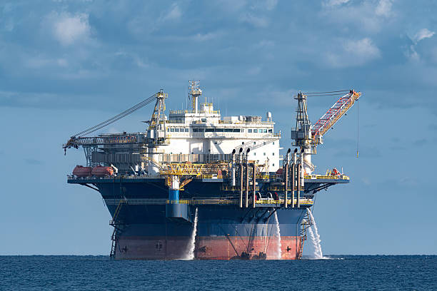 istock Offshore Accommodation platform pumping water at sea on cloudy day 2243399618