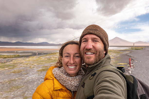 istock Smiling Couple Taking Selfie While Hiking in Bolivia 2243400609