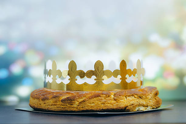 istock One whole royal galette with crown on a table with boke. 2243400666
