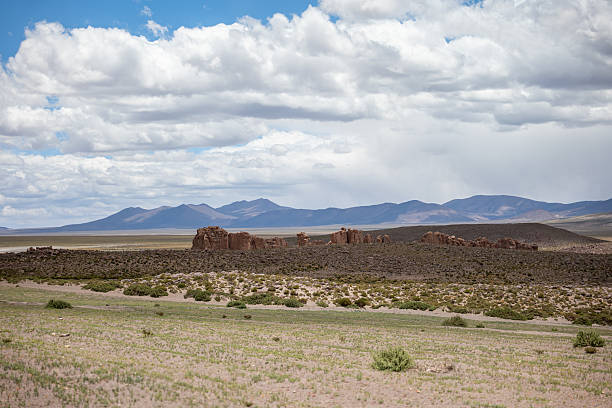 Panorama of Patagonian Mountains at Sunset: Imposing landscape with rocky peaks and pine forests, natural serenity. Manzano Amargo, Neuquen, Argentina