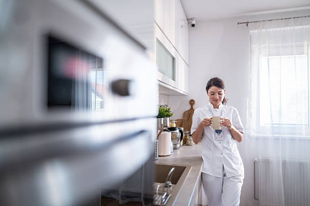 istock Healthcare worker relaxing at home, enjoying coffee break 2243404906