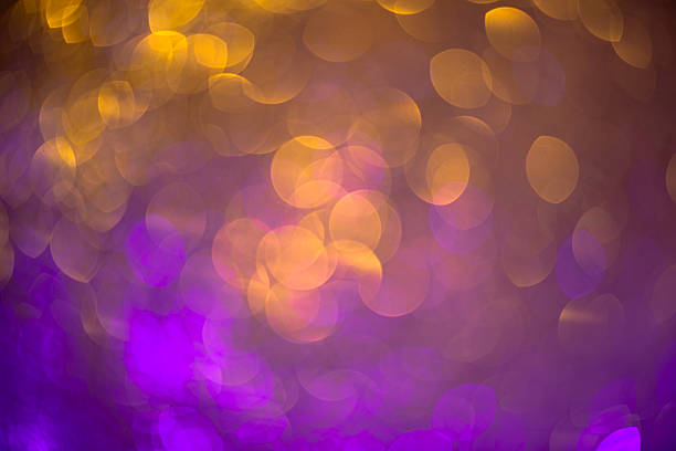 A festive abstract background filled with glowing pink and golden tones, this image blends circular bokeh patterns, blurred light, and glitter sparkles. The soft lighting equipment and bubble textures make it ideal for Christmas themes, valentines cards, 50th birthday celebrations, or Holiday Backgrounds. Designed to celebrate joyful moments with elegance and charm.