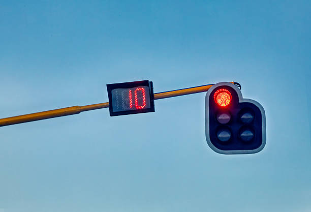 istock traffic light with a countdown timer, control the flow of traffic at intersections and pedestrian crossings, hanging above 2243408081