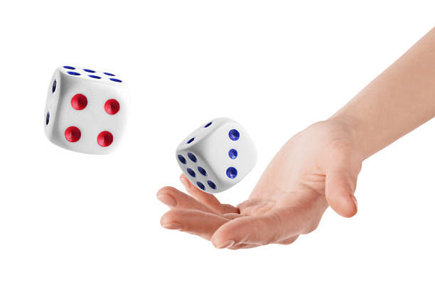 istock Man throwing dice on white background, closeup 2243429289