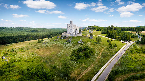 Renovated royal Castle in Mirow. The Castle was built in the middle of the 14th century in the Krakow-Czestochowa Jura, Poland. Bobolice castle in background