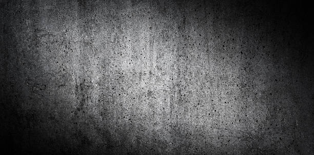 istock Dark Concrete Wall Texture — Grunge Industrial Background with Spotlight Lighting 2243430517