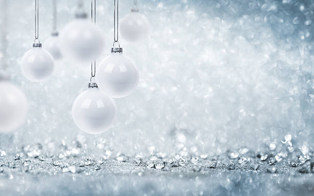 istock White Christmas Baubles with Sparkling Silver Background — Elegant Holiday Decoration 2243432062