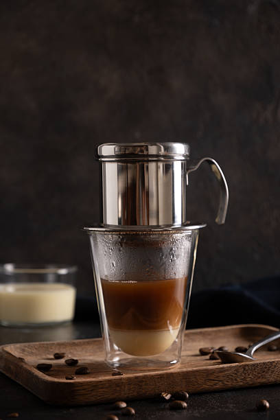 istock Traditional method of making vietnamese coffee with condensed milk. 2243432658
