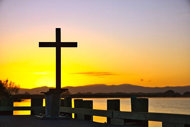 istock Wharf Sunrise Cross 2243443874