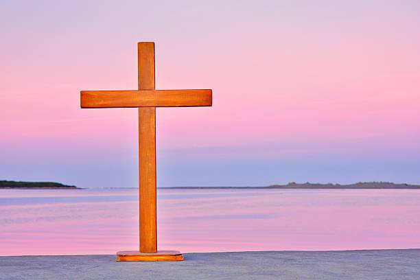 istock Wharf Sunrise Cross With Colorful Horizon 2243443875