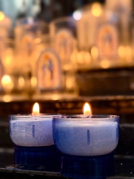 istock votive candles in a cathedral 2243446909