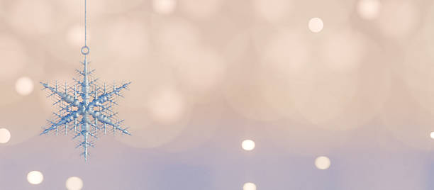 istock Snowflake ornament hanging with blurred festive lights, winter holiday decoration. 3d rendering 2243455630