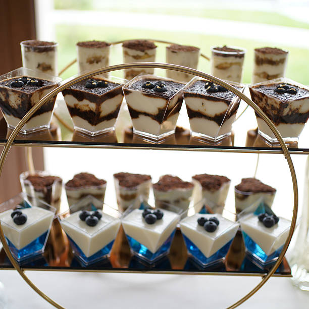 istock Mini desserts in transparent cups with cream for a festive buffet. 2243458981