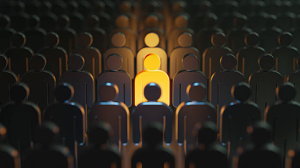 istock Leading Figure in a Highlighted Row Stands Out Among a Large Crowd 2243460316