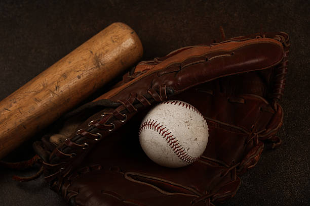 istock Baseball bat, glove and ball with vintage style 2243464009