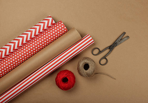 istock Wrapping paper, twine and scissors for holiday crafting 2243464079