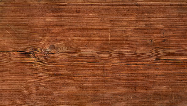 istock Rustic brown wooden surface showing natural timber texture background 2243464123